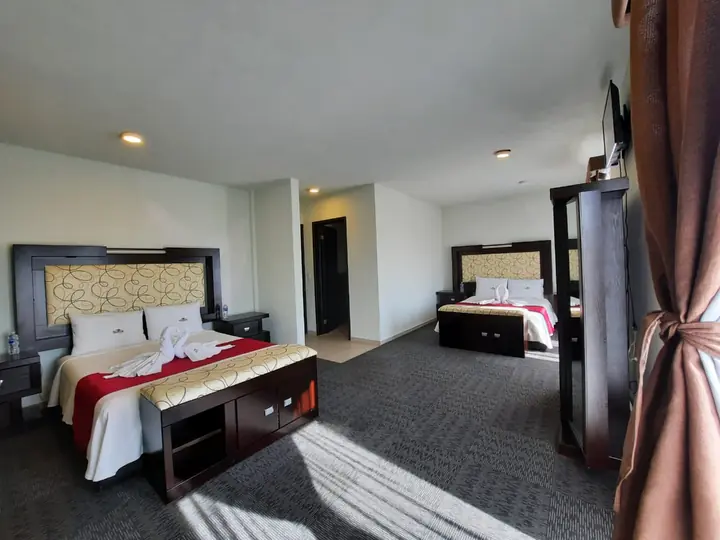 Habitación Cuádruple del hotel con dos camas Queen