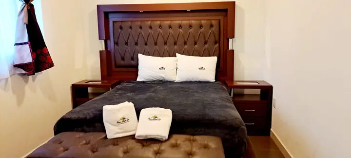 Suite Cuádruple, recámara con cama Queen
